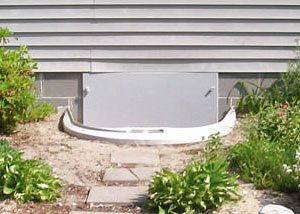 Rigid plastic crawl space access well installed in a Burnaby crawl space