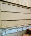 an old-fashioned crawl space door in Cultus Lake about to be replaced