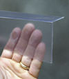 Closeup of a clear plastic covering on a North Vancouver crawl space block wall